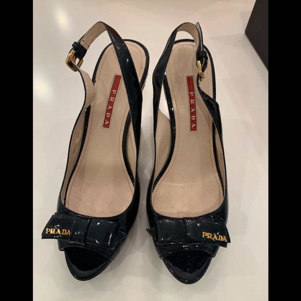 Black patent Prada sling back with wedge rope heel